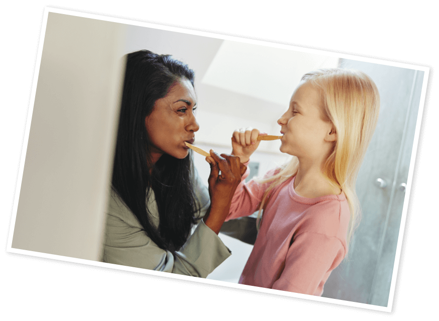 brevard_family_partnership_homepage_about_us Photo of woman and a child brushing their teeth